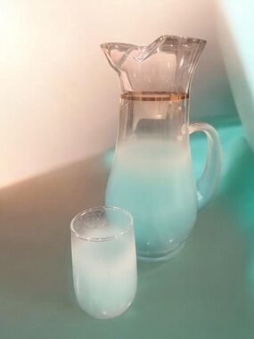 1960s Blendo frosted turquoise pitcher with gold band and matching glass.